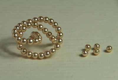 5010091  50 X Glasparel Champagne 4mm.