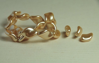 5010097 10 X Glasparel fantasie Champagne 19mm.