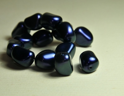 5010261 1 X Glasparel paars 25x21mm.