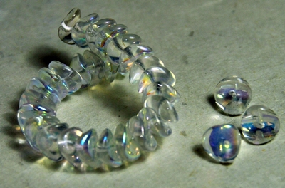 5030310 25 X Glaskraal transpapant AB 4X9mm