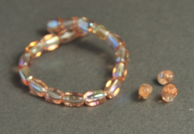 5030425 25 X Glaskraal rose AB 6X4mm